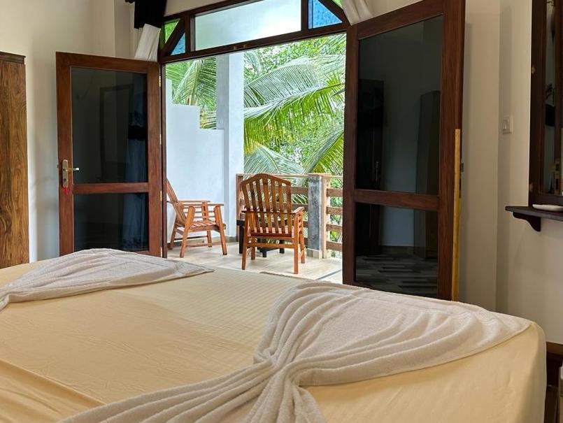 Siyon Yula - Guest House Hikkaduwa Extérieur photo